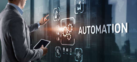 Man clicks on 3d virtual screen Automation. Optimization of business and production processesの写真素材