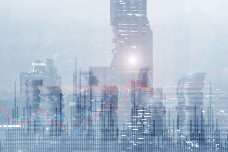 Business development. Stacks of coins on the background of the city. Positive dynamics. Growth areaの写真素材