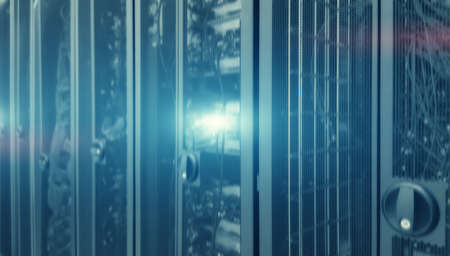 3D Server rack cluster in a data center. Blurred Background.