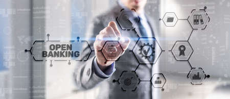 Open Banking Online Finance Concept. Man clicks on a virtual screen inscriptionの写真素材