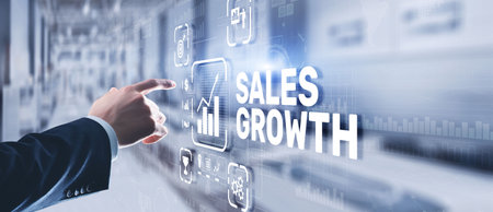 Sales Growth Man clicks inscription on virtual 3D screenの写真素材