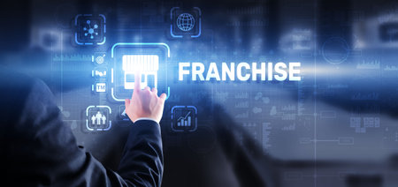 Businessman hand touching inscription Franchise marketing systemの写真素材