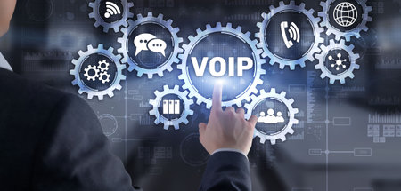 VoIP Voice over IP. Businessman pressing virtual screen Voice over Internet Protocolの写真素材