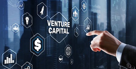 Venture capital. Investor capital. Businessman pressing virtual screen inscriptionの写真素材
