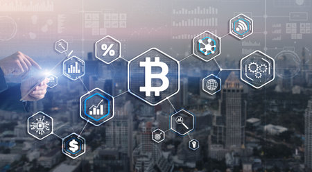 Man clicks on a virtual screen bitcoin iconの写真素材