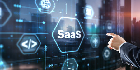 SaaS software as a service concept with hand pressing a buttonの写真素材