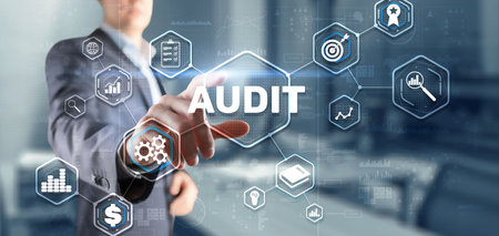 Audit. Checking the financial statements of the company. Businessman touching Audit on 3d virtual screenの写真素材