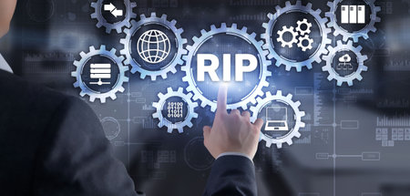 RIP. Businessman pressing virtual screen Routing Information Protocol. Technology networks conceptの写真素材