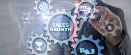 Businessman drawing 3d graphics on virtual screen sale growthの写真素材