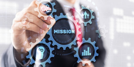 Bisinessman hand touching button mission. Finance backgroundの写真素材