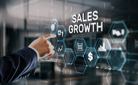 Sales Growth Man clicks inscription on virtual 3D screenの写真素材
