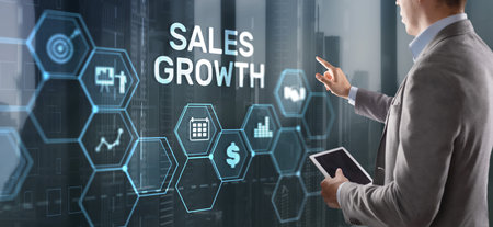 Sales Growth Man clicks inscription on virtual 3D screenの写真素材