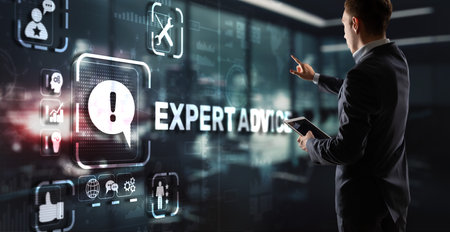Expert advice. Businessman hand touching inscription on virtual screenの写真素材