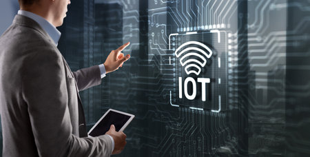 Clicking on the virtual screen Internet of Things IOT concept. Electric circuits graphic background with Infographicの写真素材