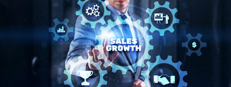 Businessman drawing 3d graphics on virtual screen sale growthの写真素材
