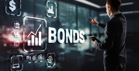 Businessman clicks a bonds virtual screen. Bond Finance Banking Technology concept. Trade Market Networkの写真素材