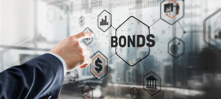 Businessman clicks inscription bonds. Bond Finance Banking Technology conceptの写真素材