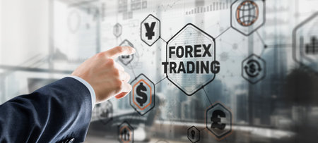 Businessman touching finger on the virtual screen and selecting Forex Tradingの写真素材