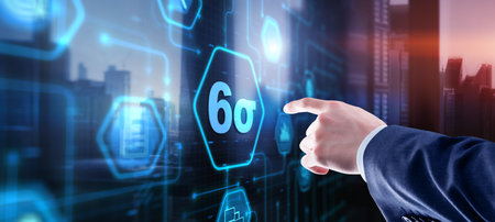 Business man pointing six sigma to control products quality processの写真素材