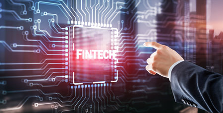 Tapping on the inscription Fintech financial technology digital money internet banking conceptの写真素材