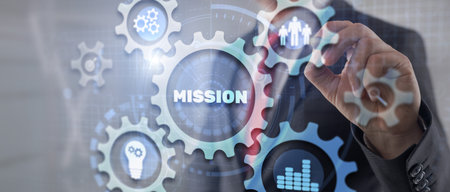 Businessman hand touching button mission. Finance backgroundの写真素材
