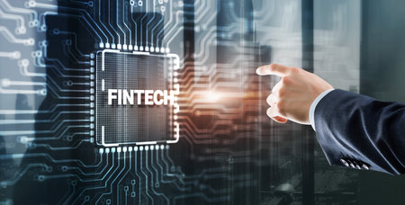 Tapping on the inscription Fintech financial technology digital money internet banking conceptの写真素材