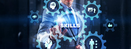 Businessman click on skills on virtual screen. Mixed Mediaの写真素材