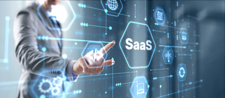 SaaS software as a service concept with hand pressing a buttonの写真素材