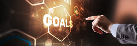 Goals against abstract technology backgroundの写真素材