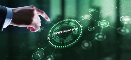 Investigation Business concept. Man presses investigations button on a virtual screenの写真素材