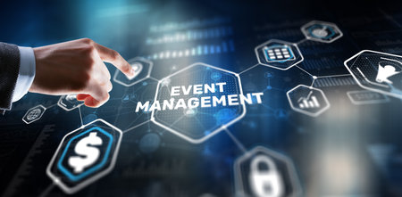 Businessman pressing on virtual screen and selecting Event Managementの写真素材