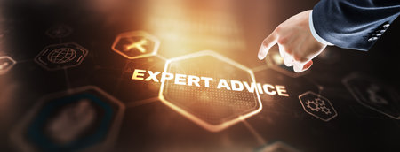 Businessman touching finger on the virtual screen and selecting Expert adviceの写真素材