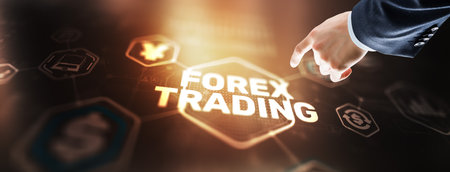 Businessman touching finger on the virtual screen and selecting Forex Tradingの写真素材
