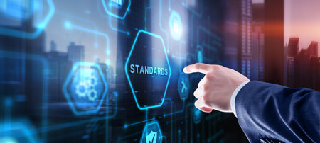 Businessman clicks Standards Quality assurance and control conceptの写真素材
