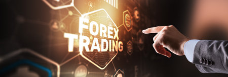 Businessman touching finger on the virtual screen and selecting Forex Tradingの写真素材