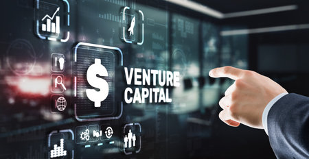 Venture capital. Investor capital. Businessman pressing virtual screen inscriptionの写真素材