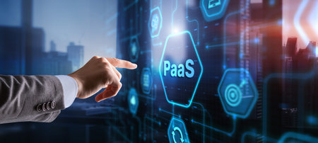Hand pressing button on interface PaaS, Platform as a Service. Internet and networking conceptの写真素材