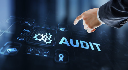 Audit. Checking the financial statements of the company. Businessman touching Audit on 3d virtual screenの写真素材