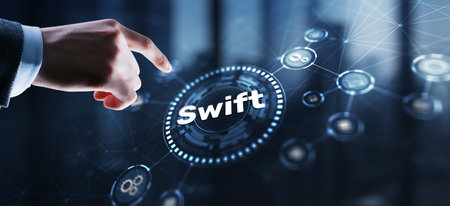 SWIFT. International bank transfer system. Society for Worldwide Interbank Financial Telecommunicationsの写真素材