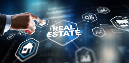 Real estate investment. Businessman pressing on virtual screensの写真素材