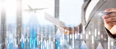 Stock market forex trading graph and candlestick chart suitable for financial investment concept.の写真素材
