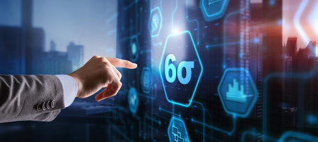 Business man pointing six sigma to control products quality process.の写真素材