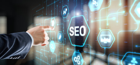 Businessman's fingers pressing a button SEO. Search engine optimization.の写真素材