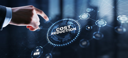 Cost reduction business finance concept. Businessman clicks virtual screen.の写真素材