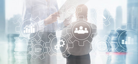 Automation of business. Gears icon on network connection.の写真素材