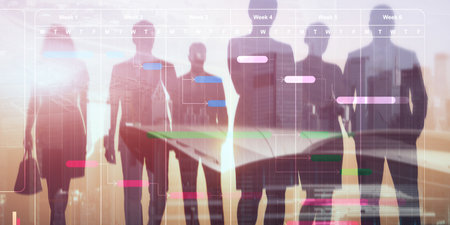 Business professional analyzing digital project timeline on interactive screen.の写真素材