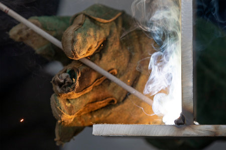<p>Welder qualification. The welder is welding with shielded metal arc welding process to steel...