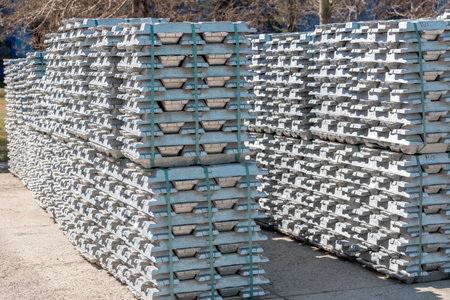 Billets of aluminum in the factory. The Hallâ€“Heroult process produces aluminum with a purity...