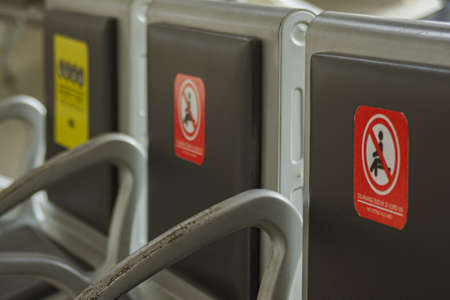 PURWOREJO, INDONESIA- November 25, 2021 : Selective focus on priority seats at Kutoarjo train stationのeditorial素材