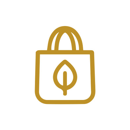 A clean golden line icon of a reusable shopping bag featuring a prominent leaf design. This visual represents eco-friendly consumption and sustainable living practices.のイラスト素材